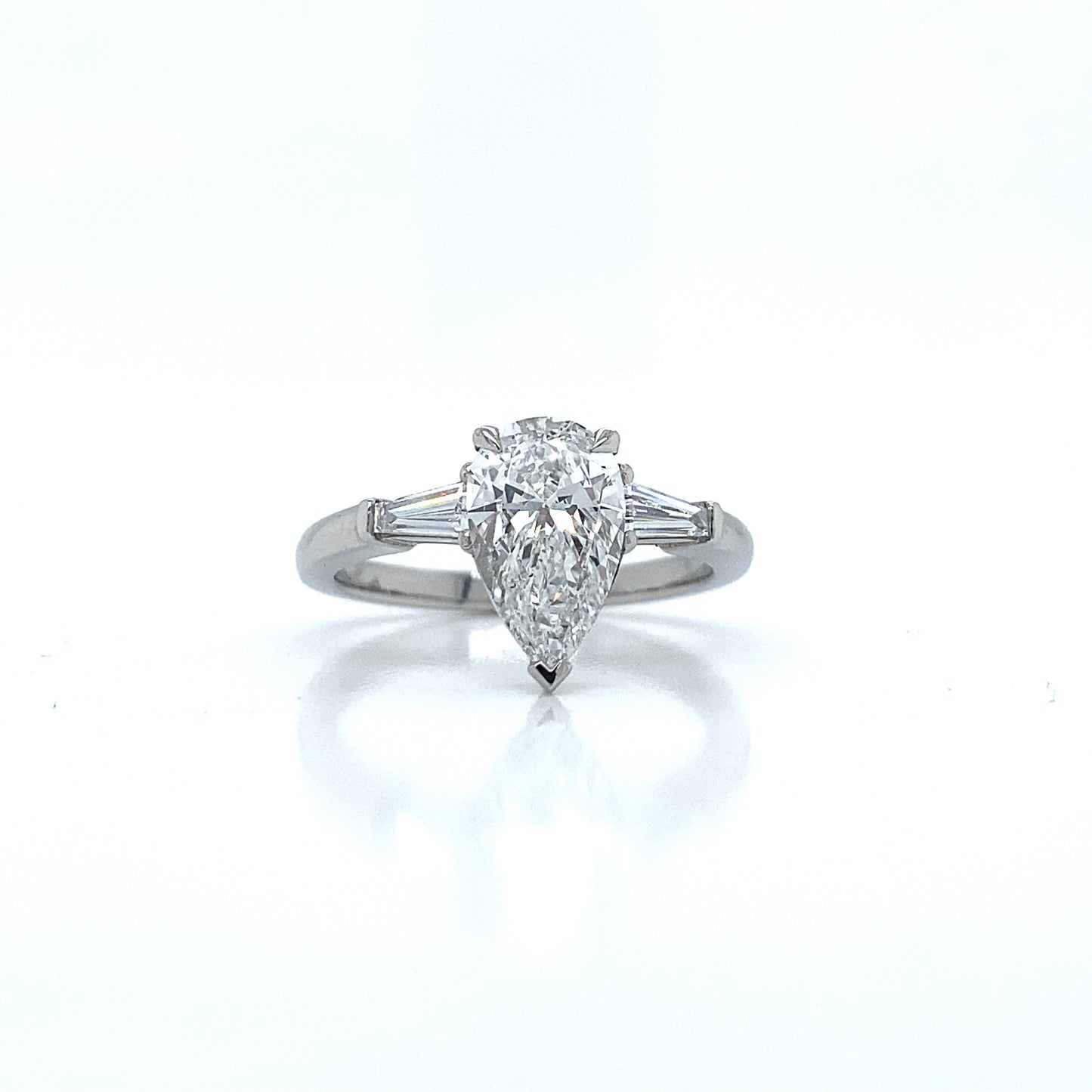 Hand-made pear shape & tapered baguette cut platinum engagement ring